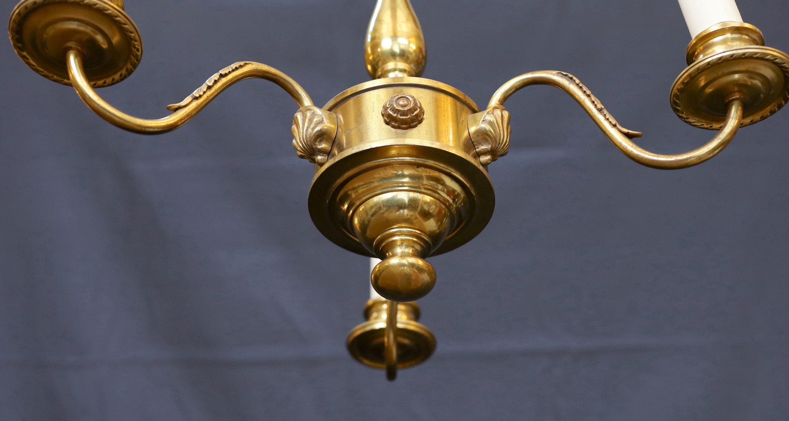 A 1930s French lacquered bronze three branch light fitting, height 35cm. width 38cm